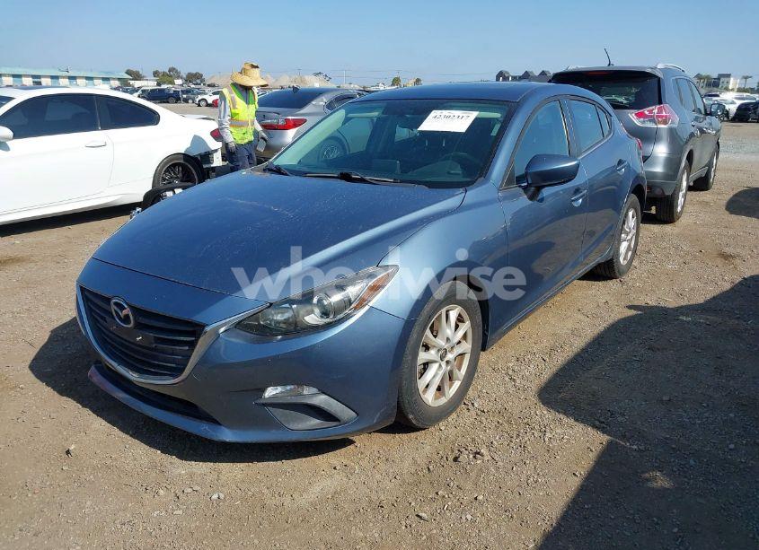 Photo 2 of 2014 Mazda Mazda3 I GRAND TOURING (VIN JM1BM1M71E1160707)
