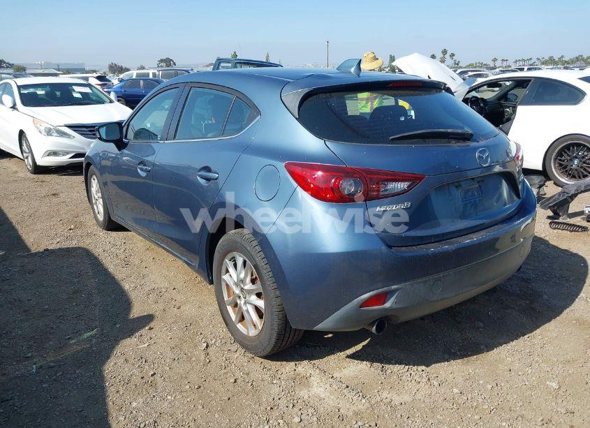 Photo 3 of 2014 Mazda Mazda3 I GRAND TOURING (VIN JM1BM1M71E1160707)