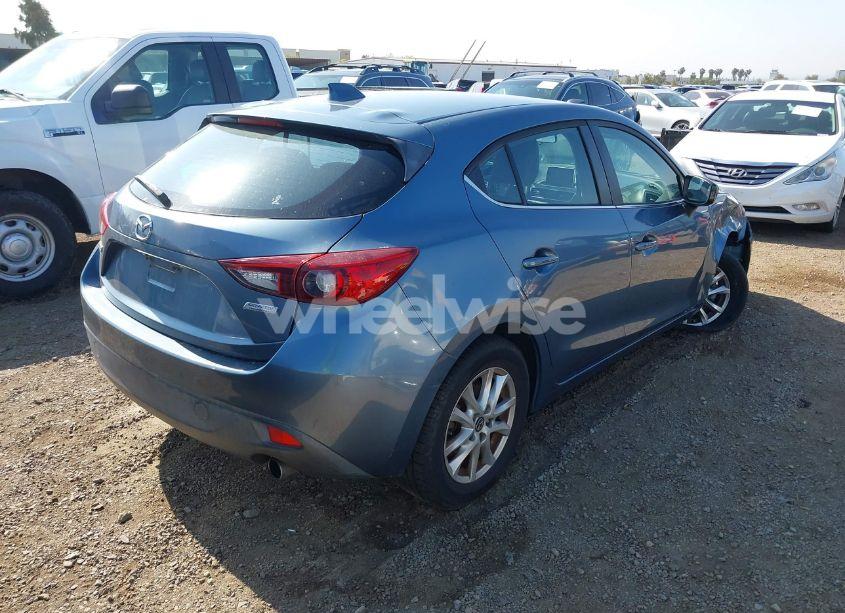 Photo 4 of 2014 Mazda Mazda3 I GRAND TOURING (VIN JM1BM1M71E1160707)