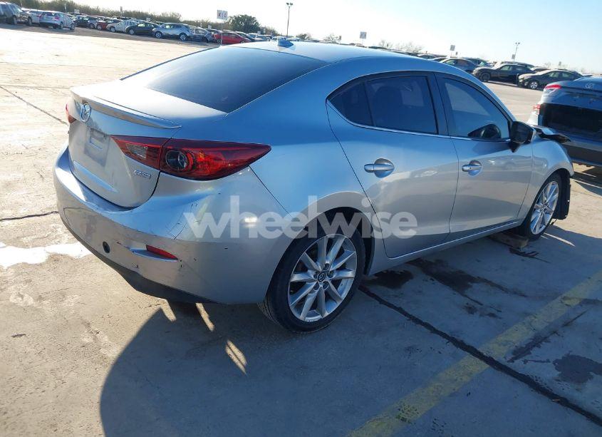 Photo 4 of 2017 Mazda Mazda3 TOURING (VIN JM1BN1V71H1100779)