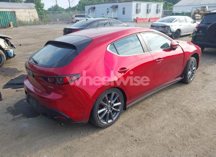 Photo 4 of 2021 Mazda Mazda3 SELECT (VIN JM1BPAKL5M1402579)