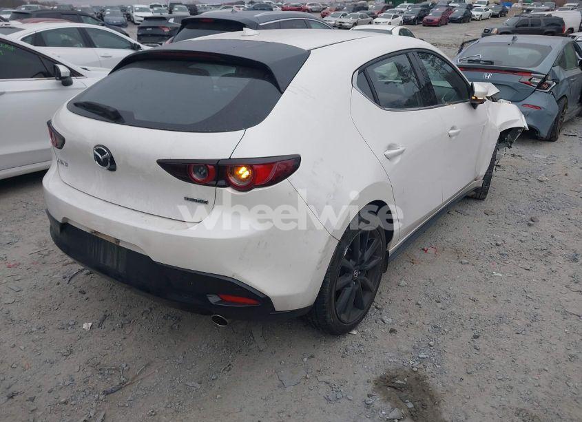 Photo 4 of 2021 Mazda Mazda3 PREMIUM (VIN JM1BPAML6M1304741)