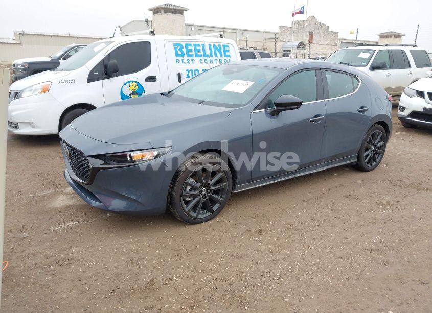 Photo 2 of 2024 Mazda Mazda3 2.5 S CARBON EDITION (VIN JM1BPBLMXR1721299)