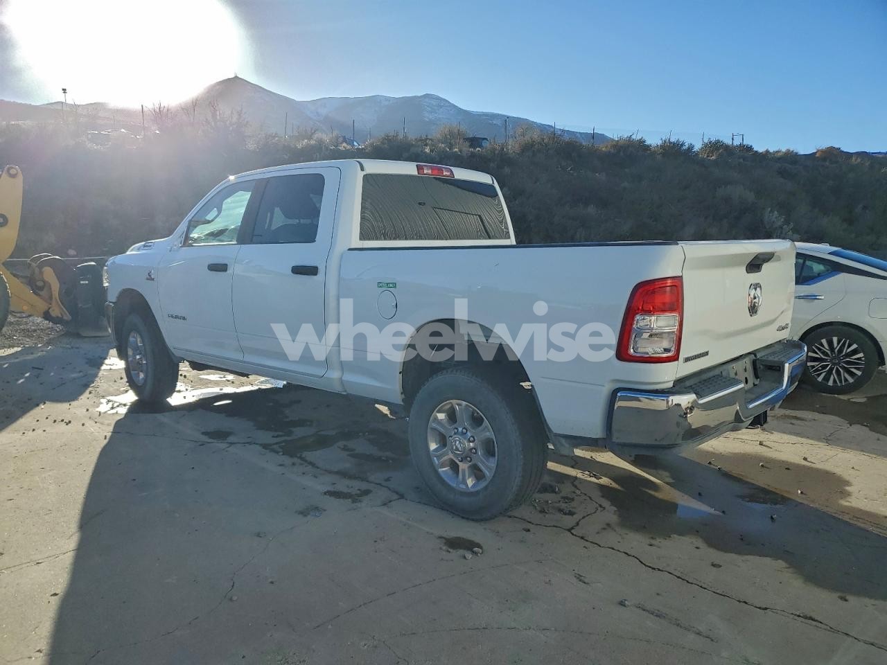 Photo 2 of 2024 RAM 2500 BIG HORN (VIN JM1CR2WL6A0367177)