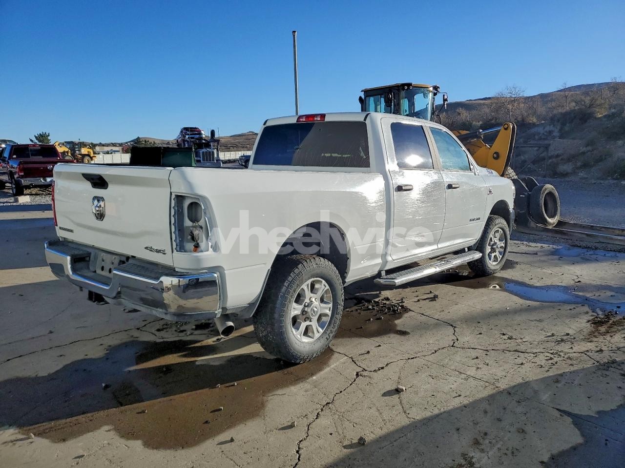 Photo 3 of 2024 RAM 2500 BIG HORN (VIN JM1CR2WL6A0367177)