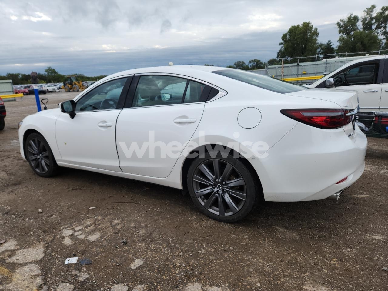Photo 2 of 2021 MAZDA 6 TOURING (VIN JM1GL1VM0M1604851)