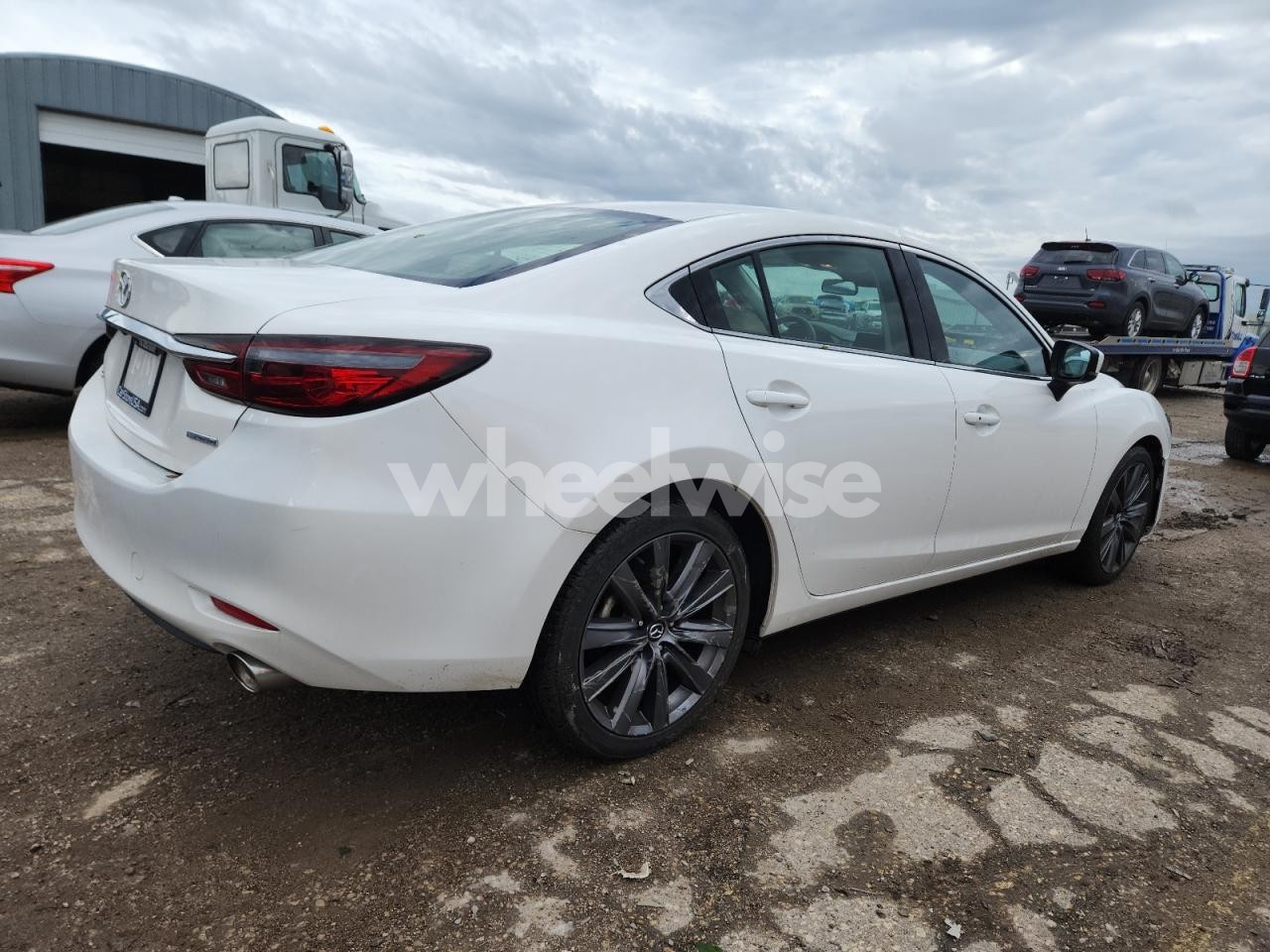 Photo 3 of 2021 MAZDA 6 TOURING (VIN JM1GL1VM0M1604851)