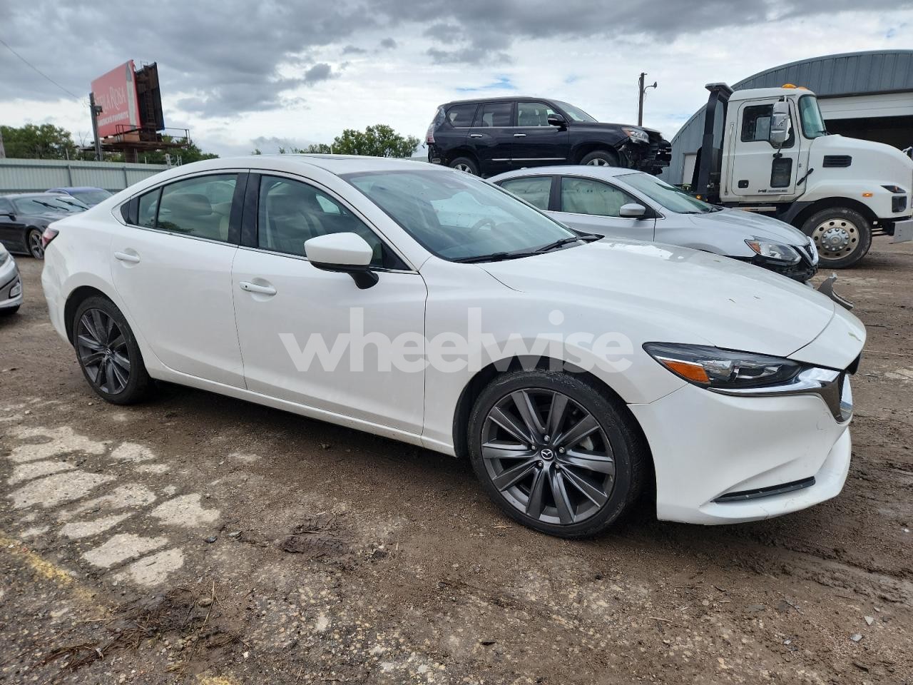 Photo 4 of 2021 MAZDA 6 TOURING (VIN JM1GL1VM0M1604851)