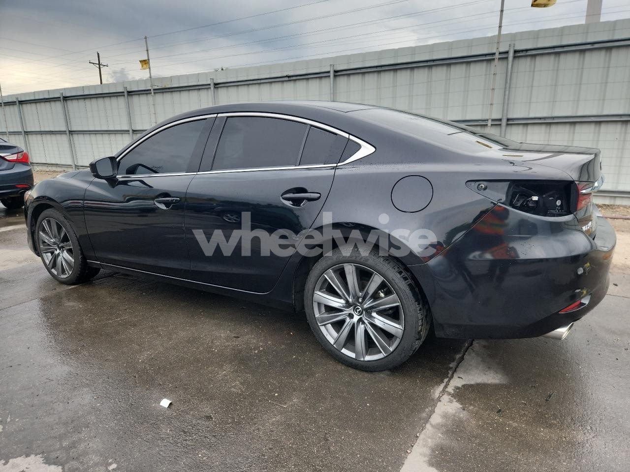 Photo 2 of 2021 MAZDA 6 TOURING (VIN JM1GL1VM5M1604540)