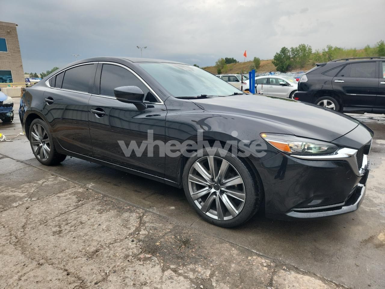 Photo 4 of 2021 MAZDA 6 TOURING (VIN JM1GL1VM5M1604540)