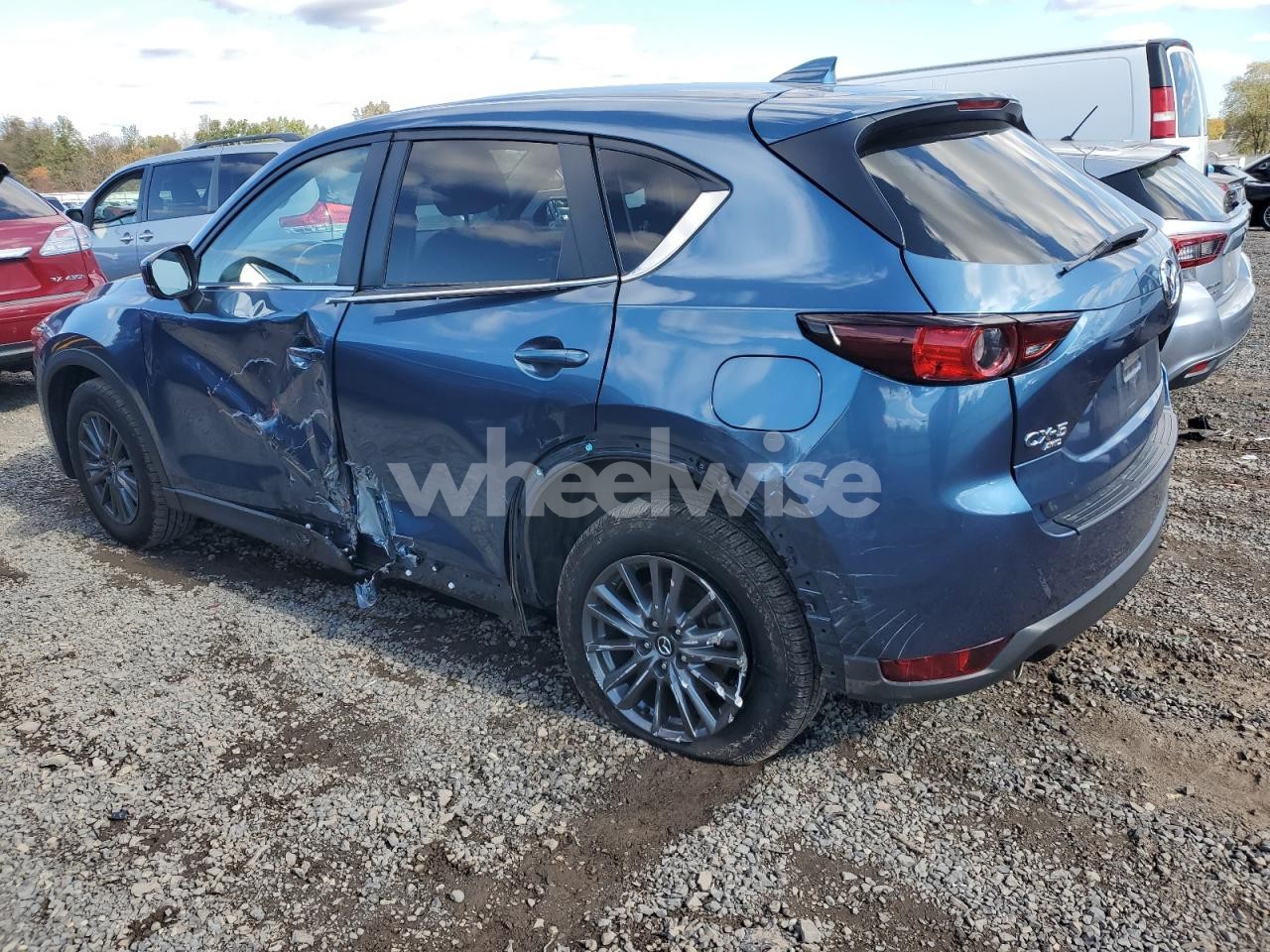 Photo 2 of 2021 MAZDA CX-5 TOURING (VIN JM3KFBCM0M1383236)