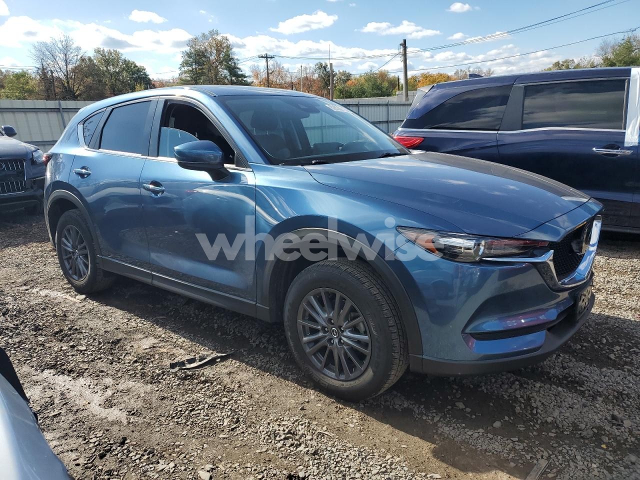 Photo 4 of 2021 MAZDA CX-5 TOURING (VIN JM3KFBCM0M1383236)
