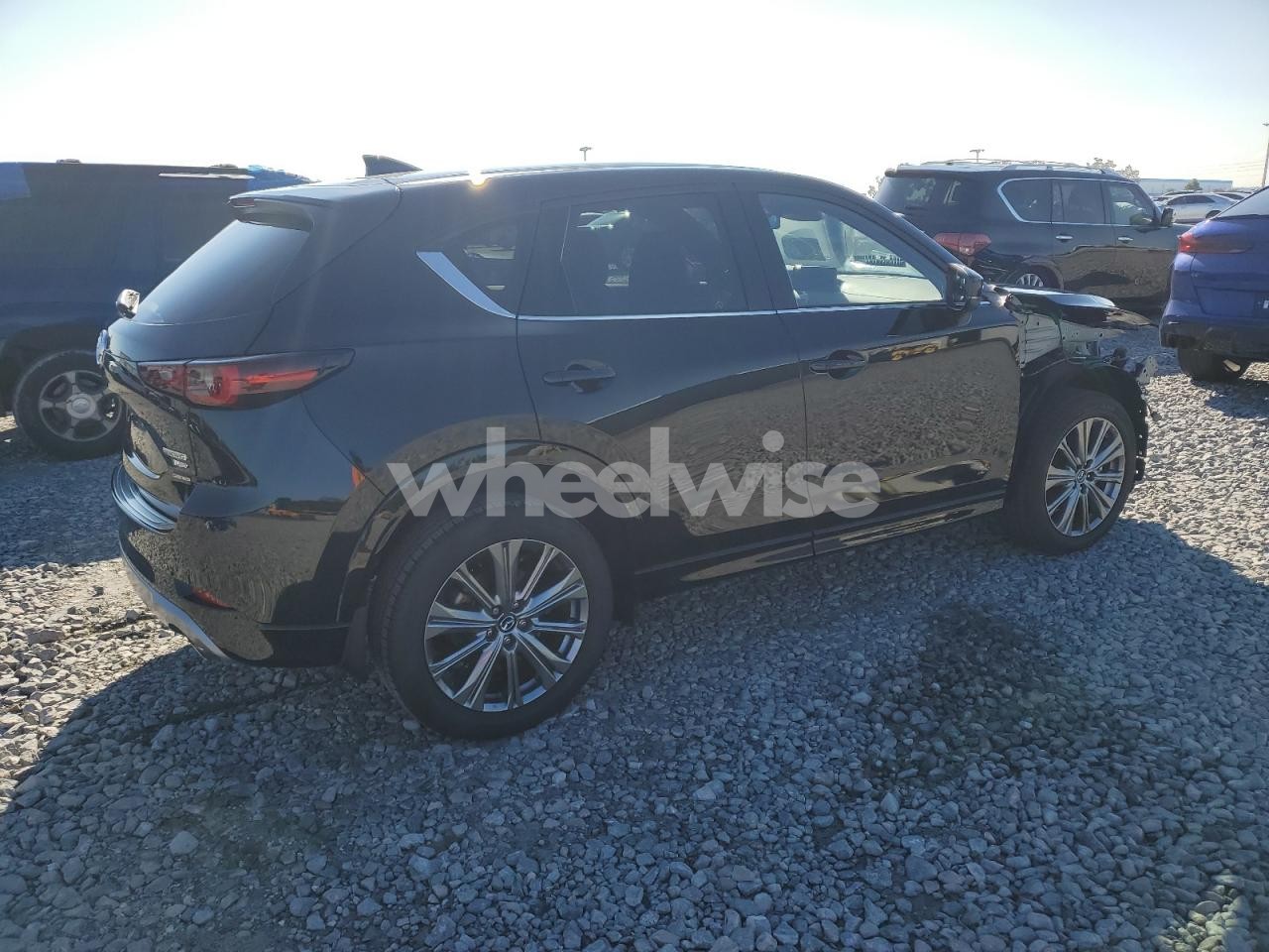 Photo 3 of 2024 MAZDA CX-5 SIGNATURE N/A (VIN JM3KFBXY3R0479842)