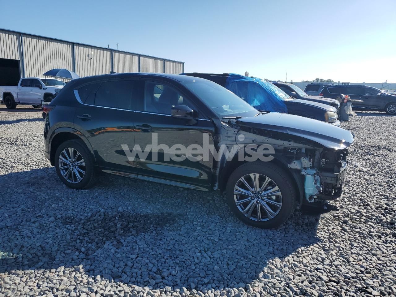 Photo 4 of 2024 MAZDA CX-5 SIGNATURE N/A (VIN JM3KFBXY3R0479842)