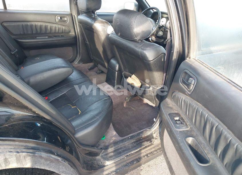 Photo 8 of 1999 Nissan Maxima GLE/GXE/SE/SE-L (VIN JN1CA21A0XT700187)