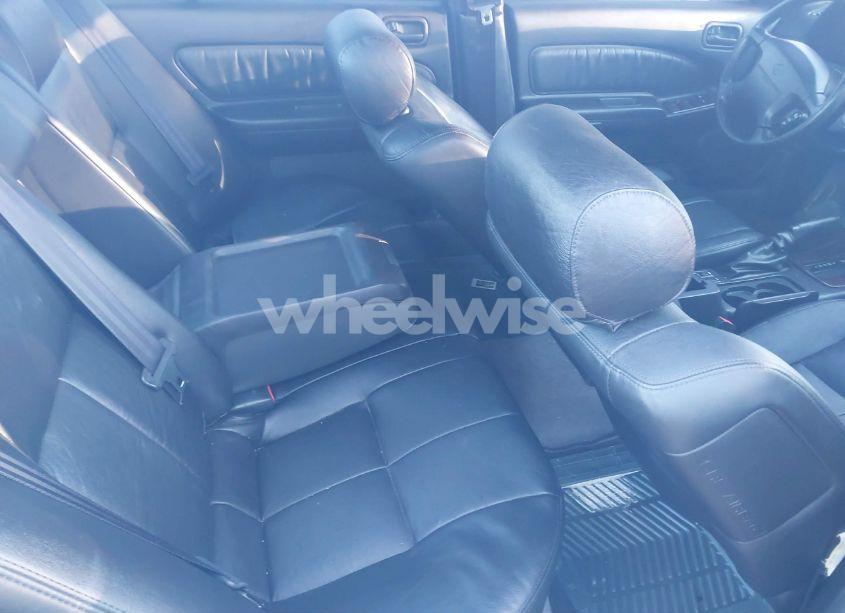 Photo 8 of 1999 Nissan Maxima GLE/GXE/SE/SE-L (VIN JN1CA21A4XT105729)