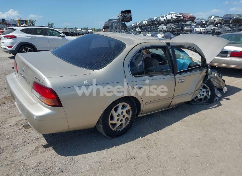 Photo 4 of 1999 Nissan Maxima GLE/GXE/SE/SE-L (VIN JN1CA21A8XT109136)