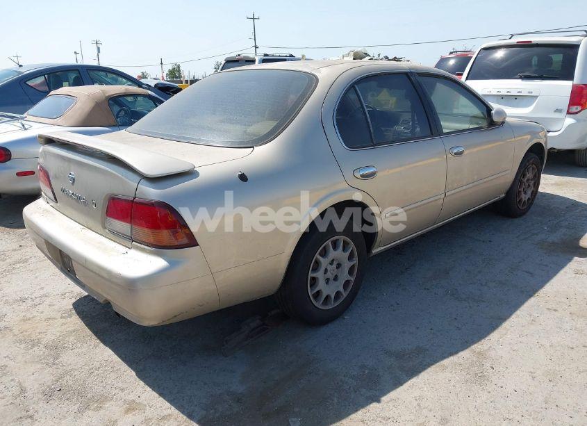 Photo 4 of 1999 Nissan Maxima GLE/GXE/SE/SE-L (VIN JN1CA21D1XM415860)