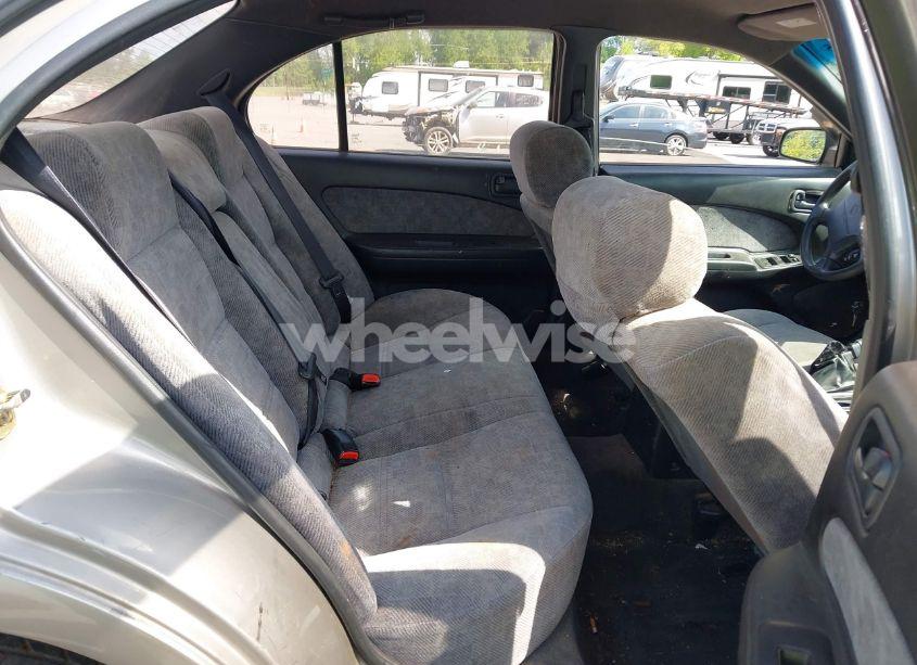 Photo 8 of 1999 Nissan Maxima GLE/GXE/SE/SE-L (VIN JN1CA21D1XT202977)