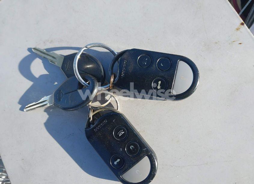 Photo 11 of 1995 Nissan Maxima GLE/GXE/SE (VIN JN1CA21D5ST631774)