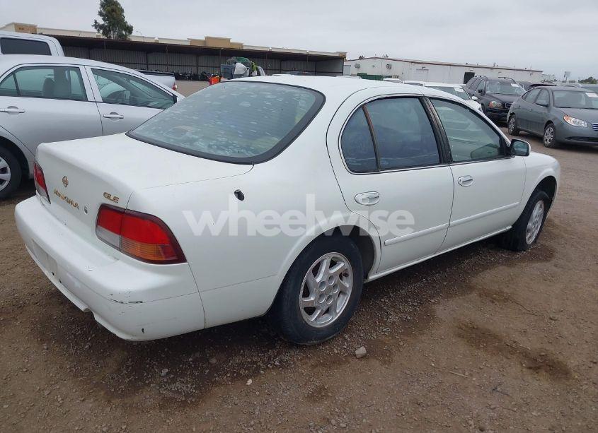 Photo 4 of 1999 Nissan Maxima GLE/GXE/SE/SE-L (VIN JN1CA21D7XT811913)