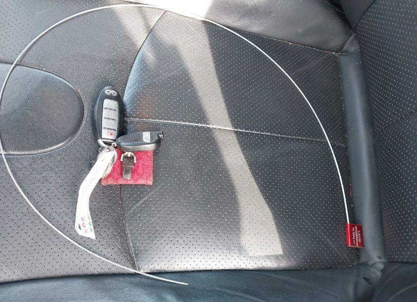 Photo 11 of 2015 Infiniti Q40 N/A (VIN JN1CV6ARXFM520659)