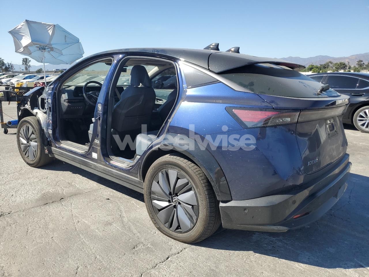 Photo 2 of 2023 NISSAN ARIYA PLATINUM + (VIN JN1DF0CD1PM709704)