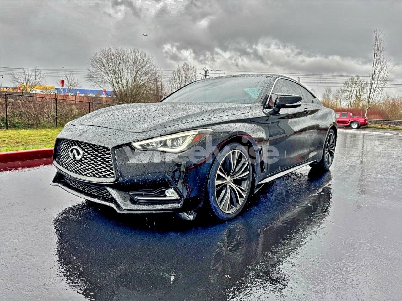 Photo 2 of 2018 INFINITI Q60 LUXE 300 (VIN JN1EV7EL1JM392535)