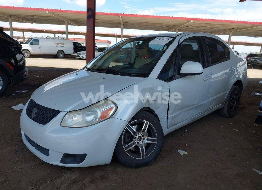 Photo 2 of 2012 Suzuki Sx4 LE/LE POPULAR (VIN JS2YC5A38C6303583)