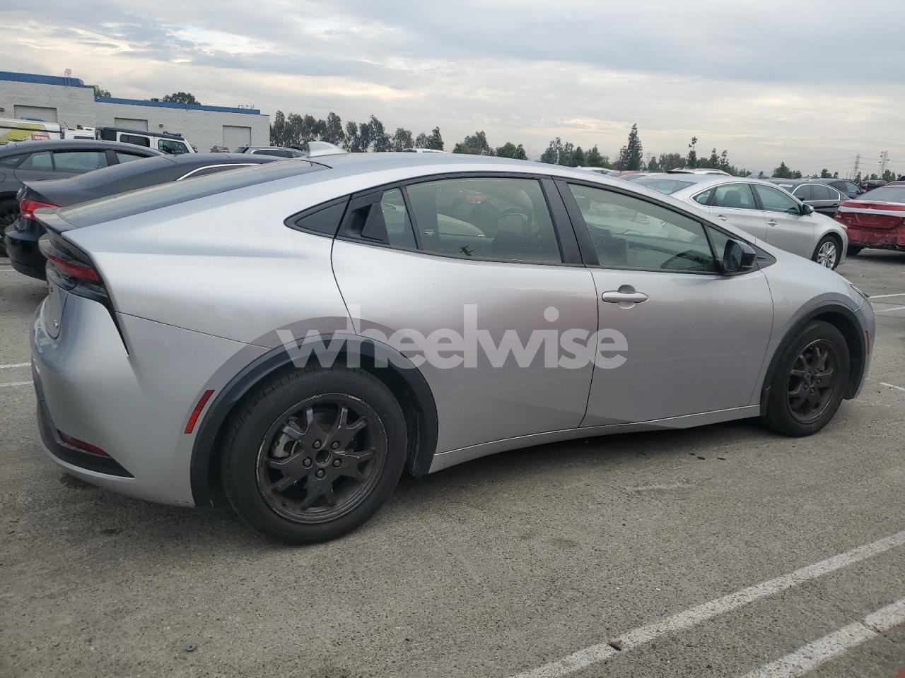 Photo 3 of 2023 TOYOTA PRIUS LE (VIN JTDACAAU4P3002717)