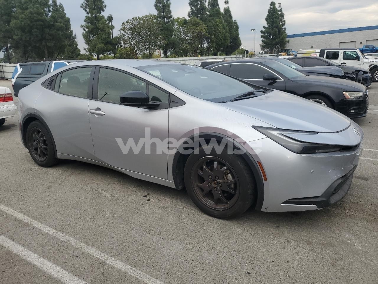 Photo 4 of 2023 TOYOTA PRIUS LE (VIN JTDACAAU4P3002717)