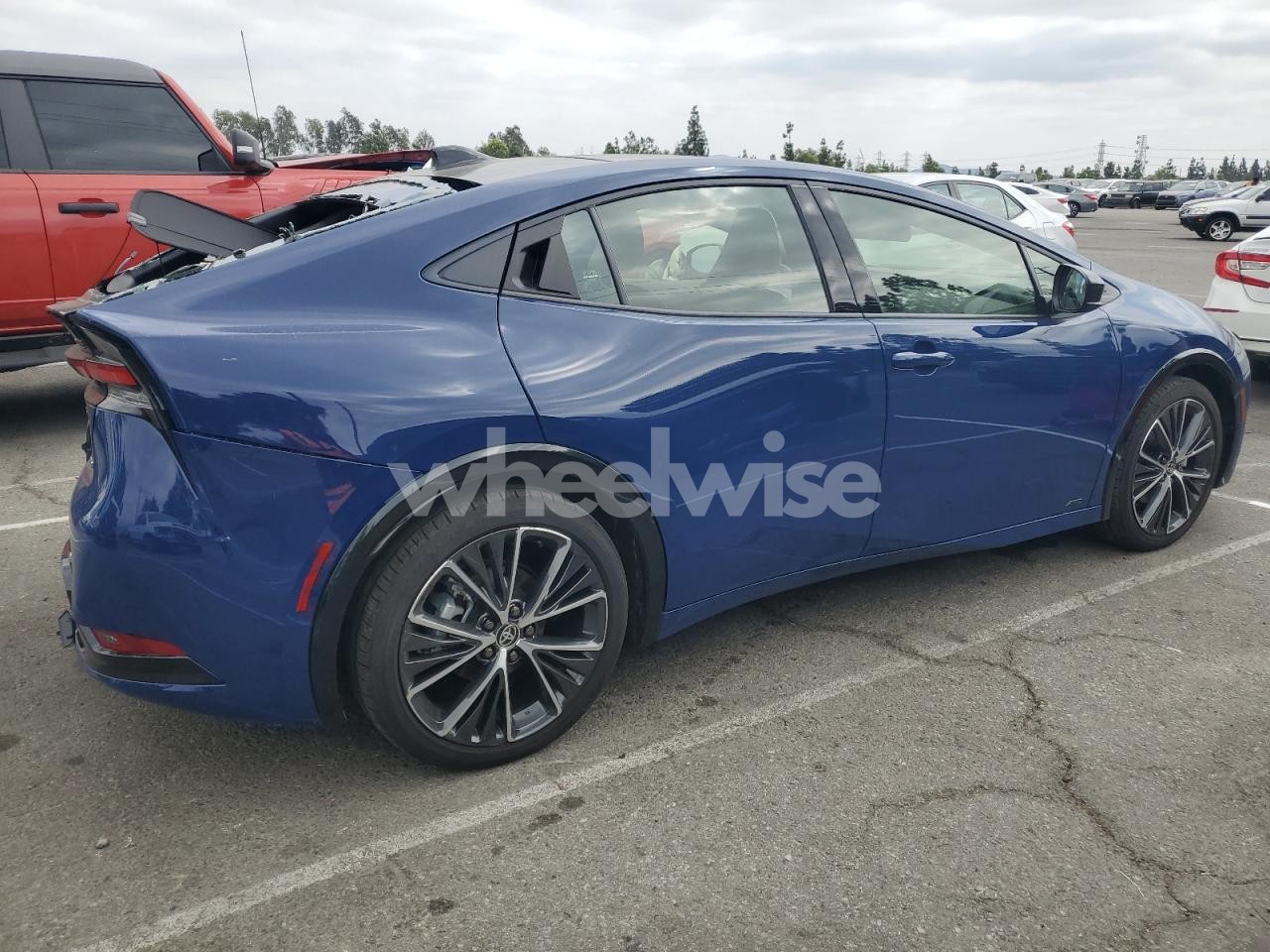 Photo 3 of 2024 TOYOTA PRIUS LE (VIN JTDADABU2R3022429)