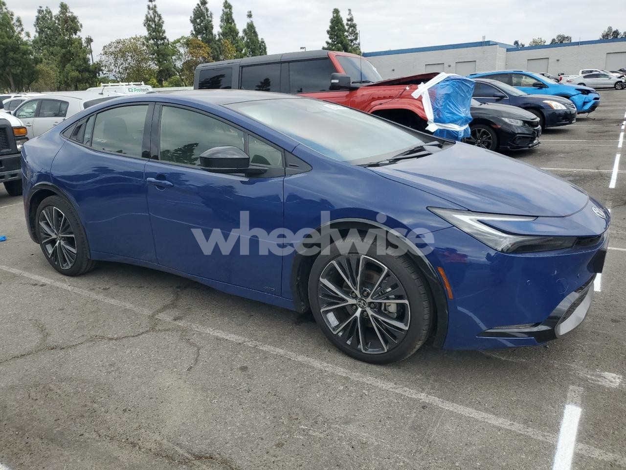 Photo 4 of 2024 TOYOTA PRIUS LE (VIN JTDADABU2R3022429)