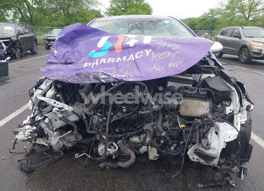 Photo 12 of 2023 Toyota Corolla LE (VIN JTDB4MEE5PJ007099)