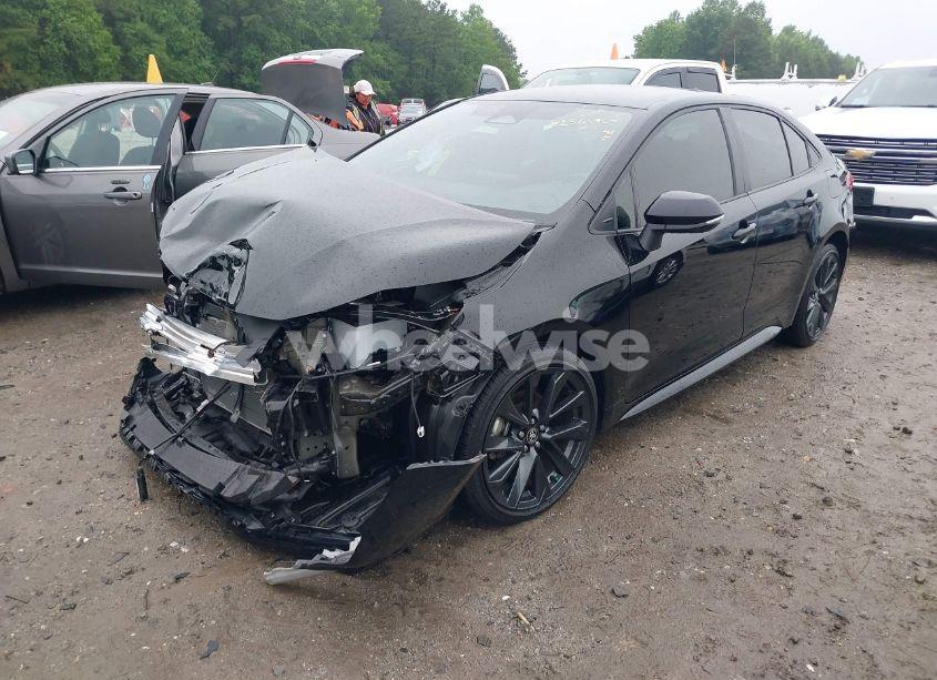 Photo 2 of 2023 Toyota Corolla HYBRID SE (VIN JTDBCMFE2P3008913)