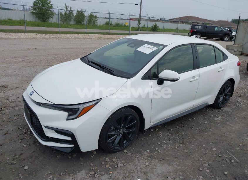 Photo 2 of 2024 Toyota Corolla HYBRID SE (VIN JTDBCMFE5R3042086)