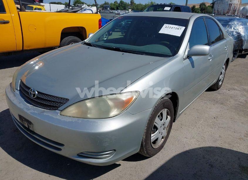 Photo 2 of 2003 Toyota Camry LE (VIN JTDBE32K130171306)