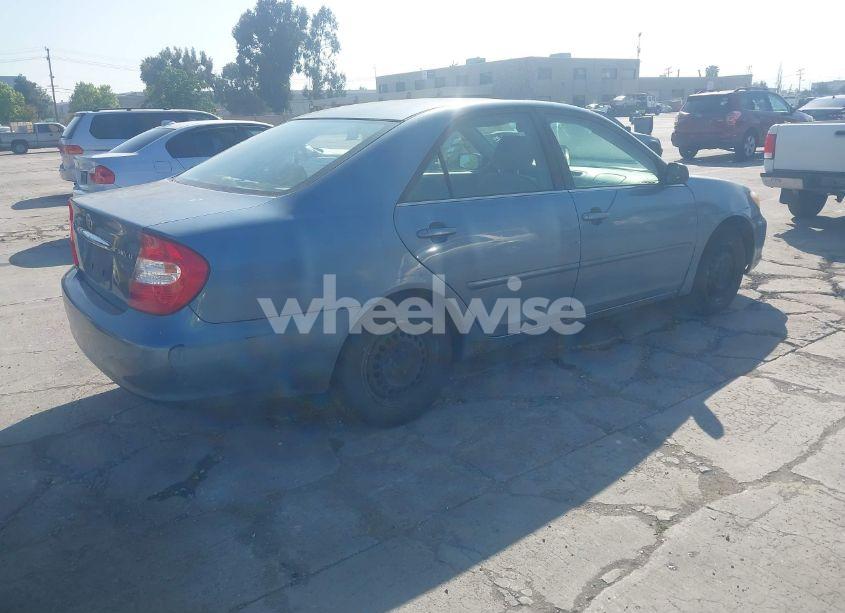 Photo 4 of 2002 Toyota Camry LE (VIN JTDBE32K520033900)