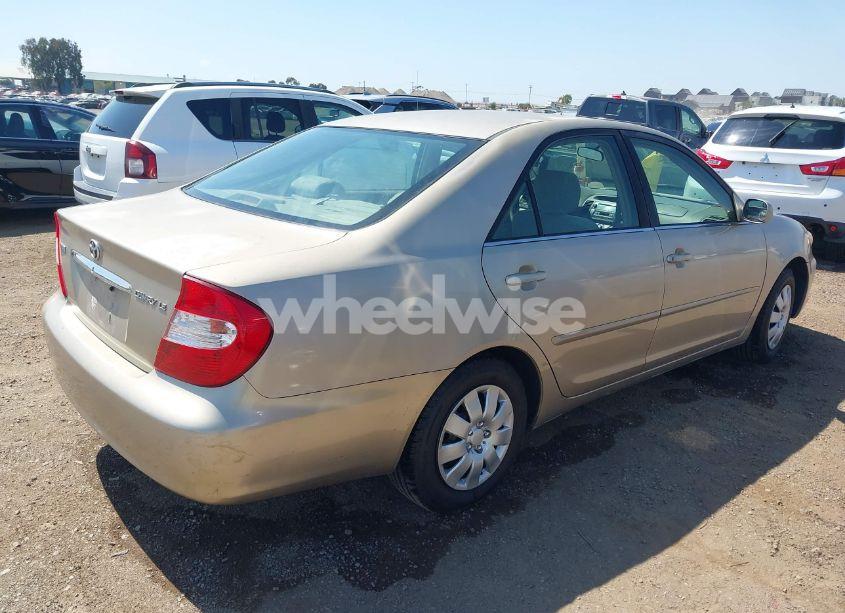 Photo 4 of 2002 Toyota Camry LE (VIN JTDBE32K520105405)