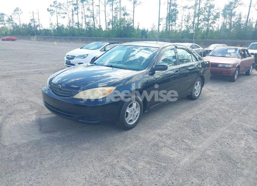 Photo 2 of 2002 Toyota Camry LE (VIN JTDBE32K720027774)