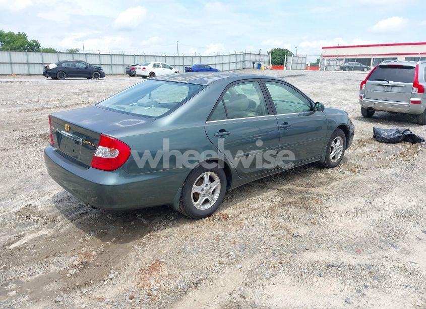Photo 4 of 2002 Toyota Camry LE (VIN JTDBE32K920007008)
