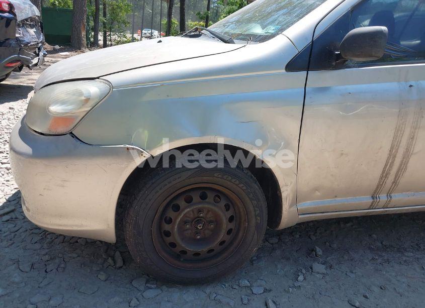 Photo 6 of 2003 Toyota Echo (VIN JTDBT123230261051)