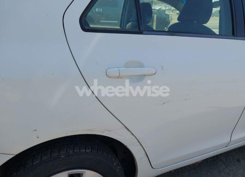 Photo 6 of 2009 Toyota Yaris (VIN JTDBT903694047800)