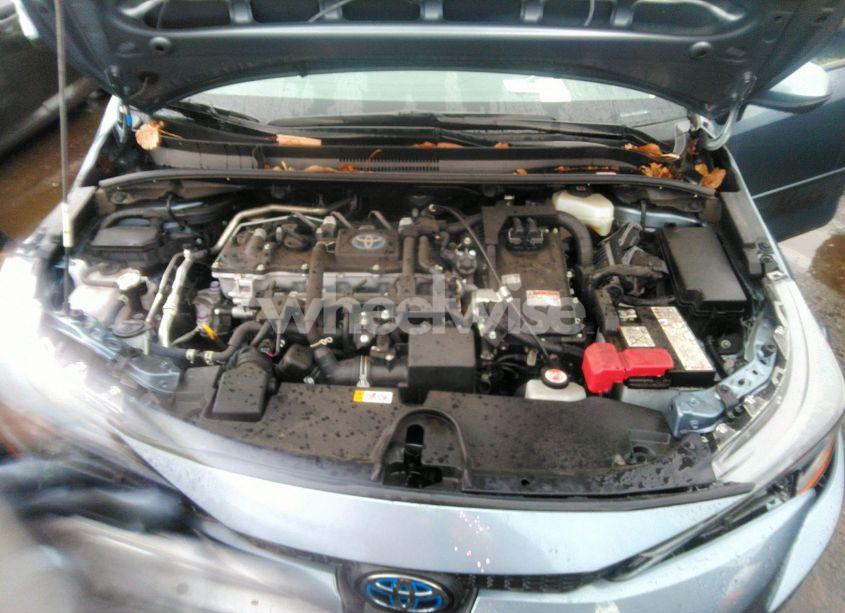 Photo 10 of 2022 Toyota Corolla HYBRID LE (VIN JTDEAMDE5N3007449)