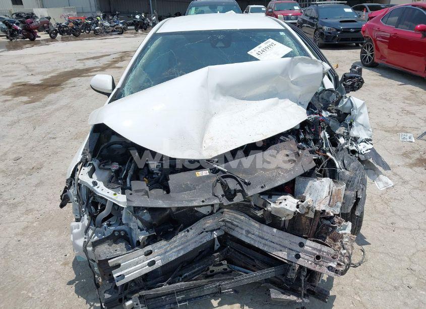 Photo 11 of 2022 Toyota Corolla HYBRID LE (VIN JTDEAMDE5NJ040057)