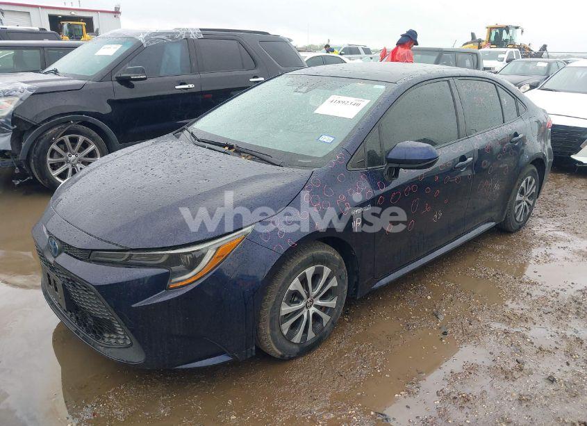 Photo 2 of 2021 Toyota Corolla HYBRID LE (VIN JTDEAMDE6MJ010838)