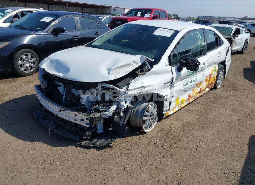 Photo 2 of 2021 Toyota Corolla HYBRID LE (VIN JTDEAMDEXMJ025424)