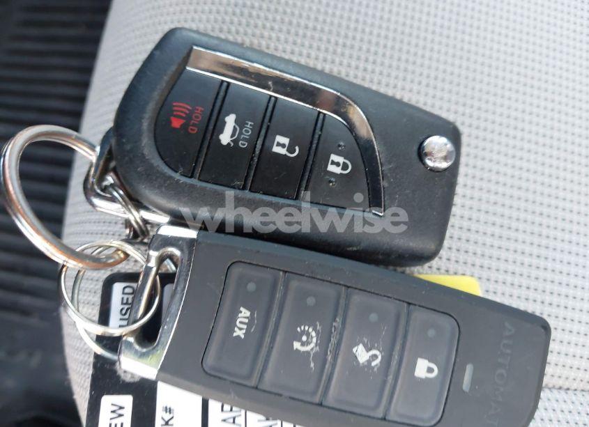 Photo 11 of 2022 Toyota Corolla LE (VIN JTDEPMAEXNJ203272)