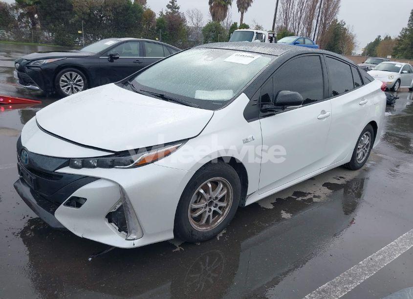 Photo 2 of 2021 Toyota Prius PRIME XLE (VIN JTDKAMFP0M3169019)