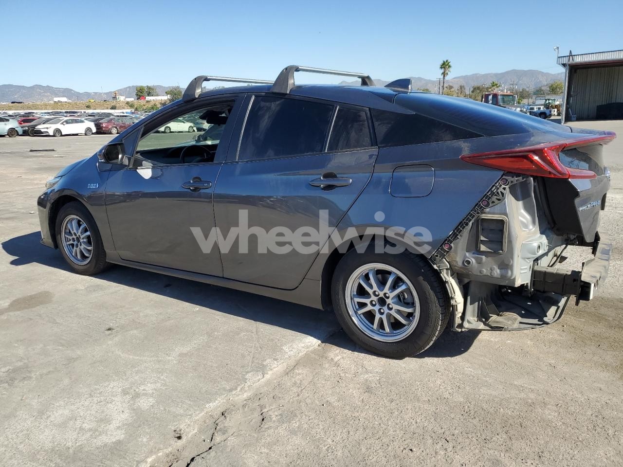 Photo 2 of 2021 TOYOTA PRIUS PRIME LE (VIN JTDKAMFP0M3194213)